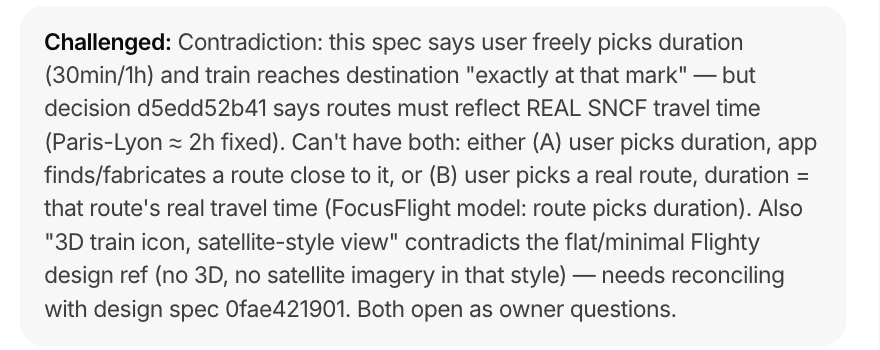 A challenge note on a spec: the AI found a contradiction between two specs and flagged it